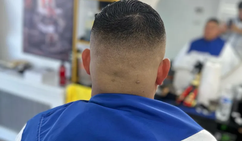 The back of a mid fade, blended clean